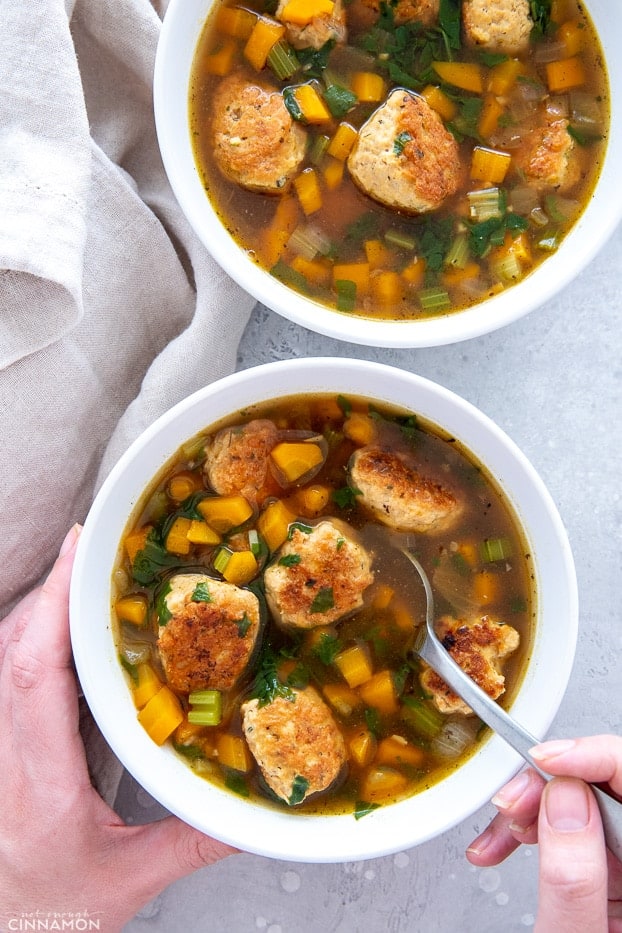 overhead shot of two bowls of Whole30 Italian Wedding Soup 