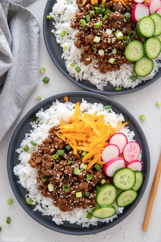 overhead shot of Korean beef bowls with rice and veggies 