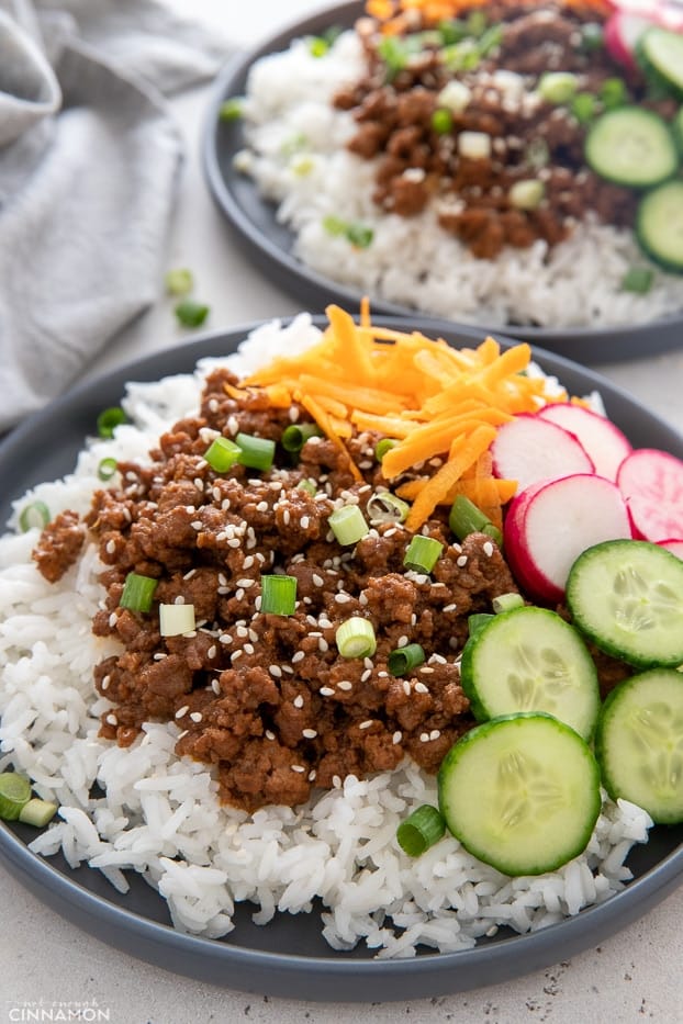 close up of Korean Beef Bowls sprinkled with sesame seeds 