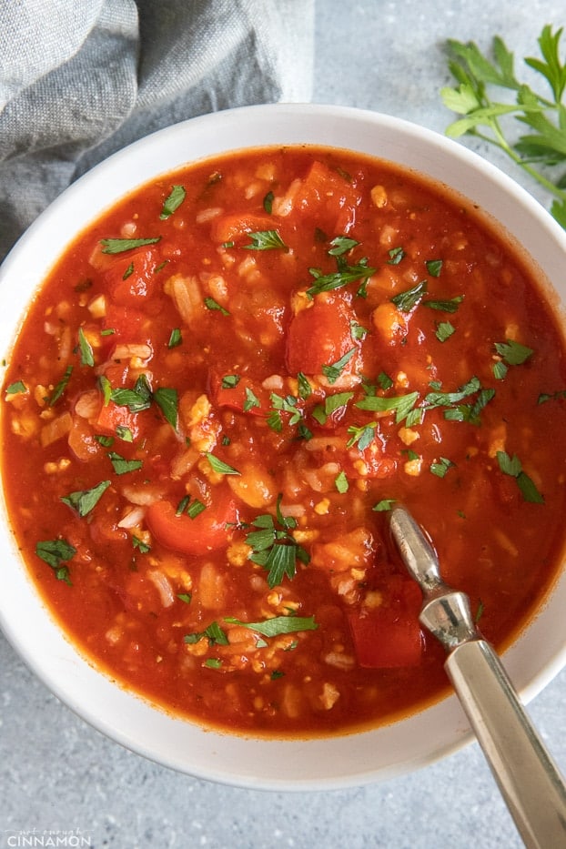 overhead shot of a bowl of paleo stuffed bell pepper soup with a spoon