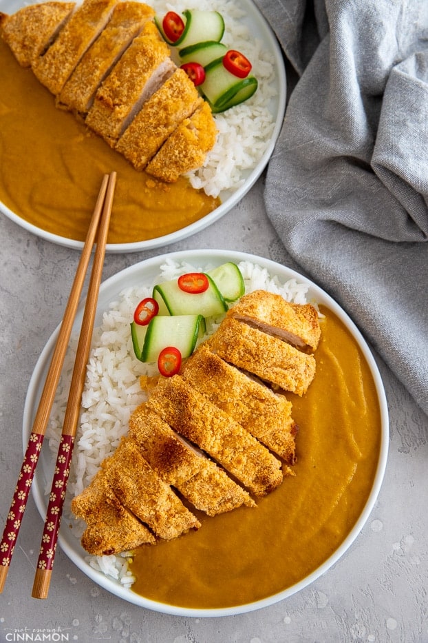 overhead shot of two bowls of healthy chicken katsu curry