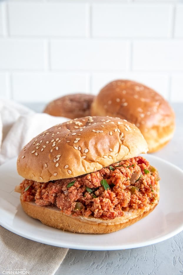 healthy Slow Cooker Ground Turkey Sloppy Joes served in a burger bun