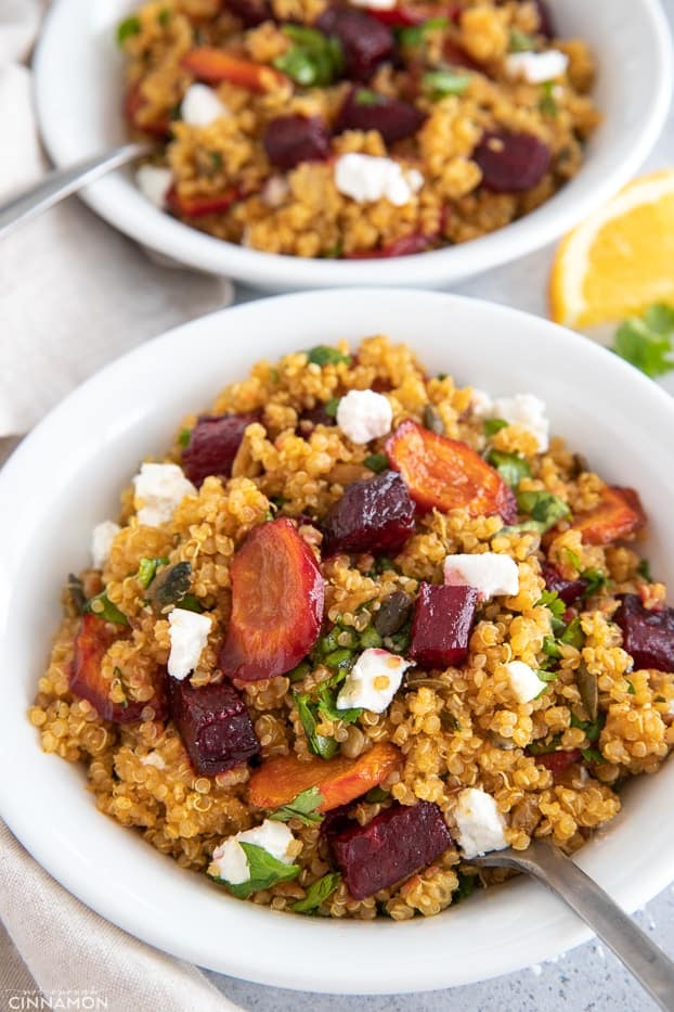 side view of a plate of vegan quinoa salad with beets and goat cheese 