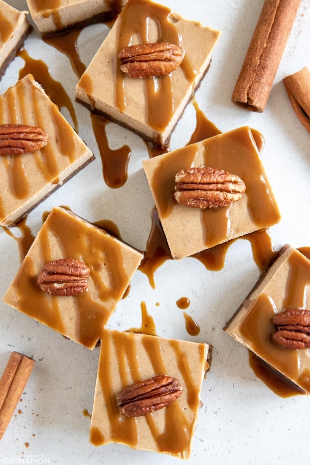 overhead shot of vegan chai latte cheesecake bars drizzled with vegan caramel 