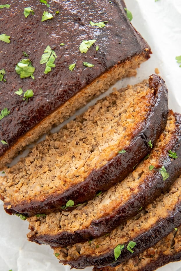 a sliced paleo turkey meatloaf glazed with homemade sugar-free bbq plum sauce