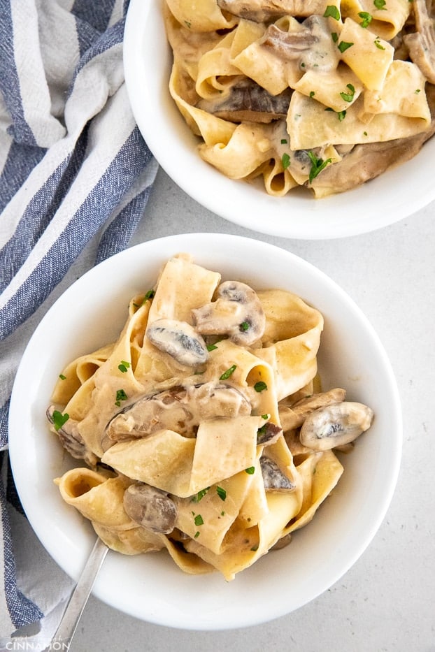 two plates of vegan mushroom stroganoff 