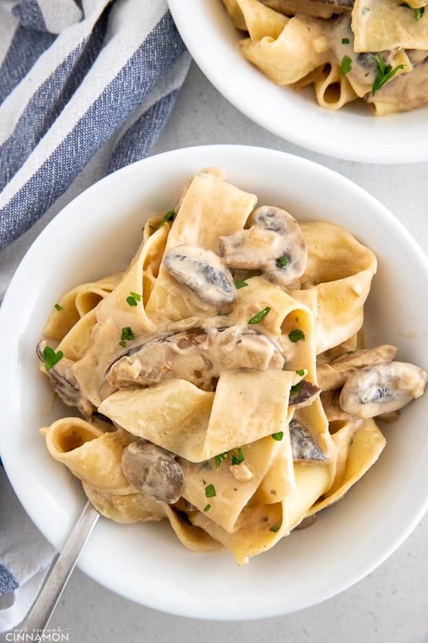 a plate with vegan pasta stroganoff with mushroom sauce