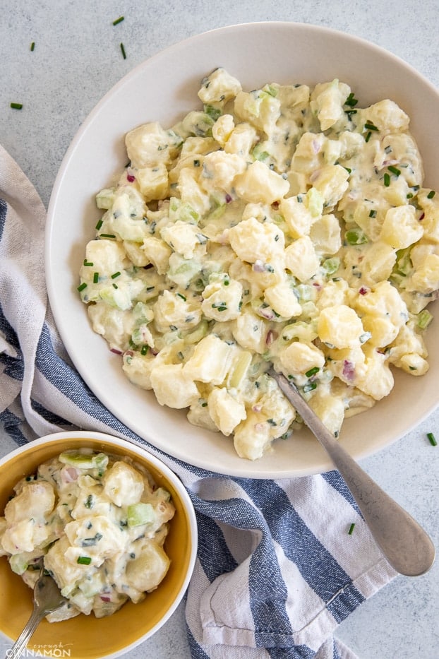 overhead shot of a white plate with healthy no mayo potato salad with greek yogurt dressing