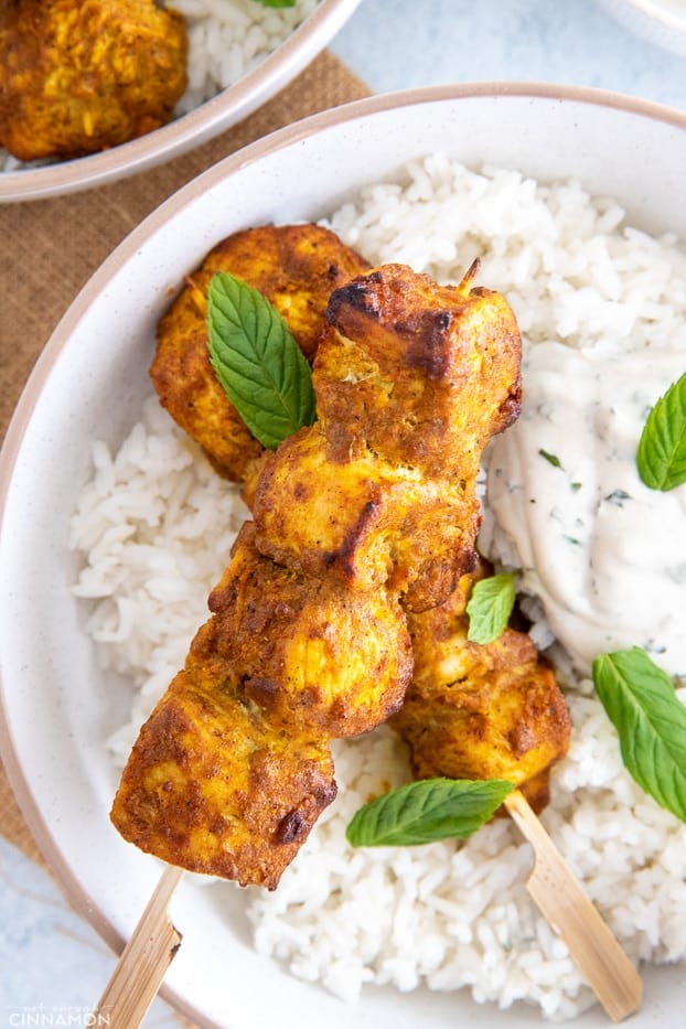 tandoori chicken bowl with rice served with dairyfree yogurt mint dip