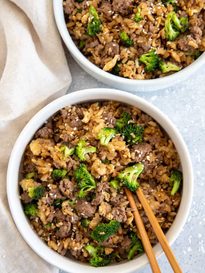 a bowl of beef and broccoli fried rice