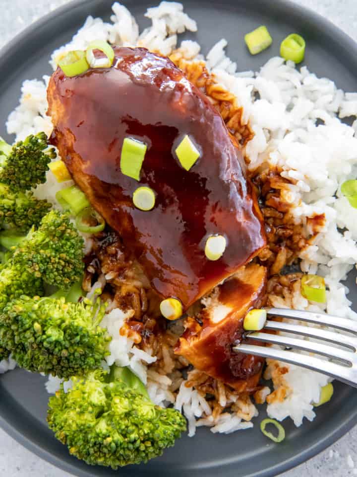 easy baked firecracker chicken served over rice